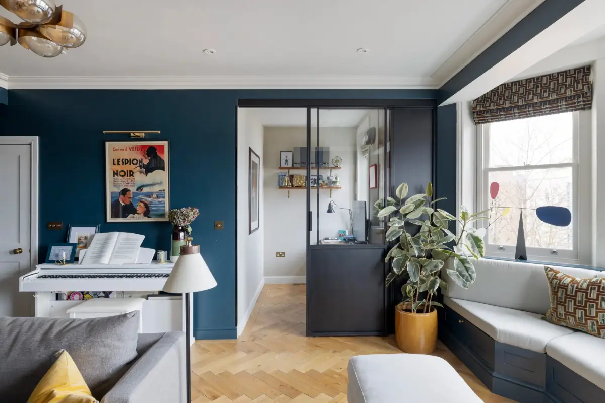 A Beautiful Duplex Apartment in a Notting Hill Townhouse 3 dark blue sitting room with home office niche