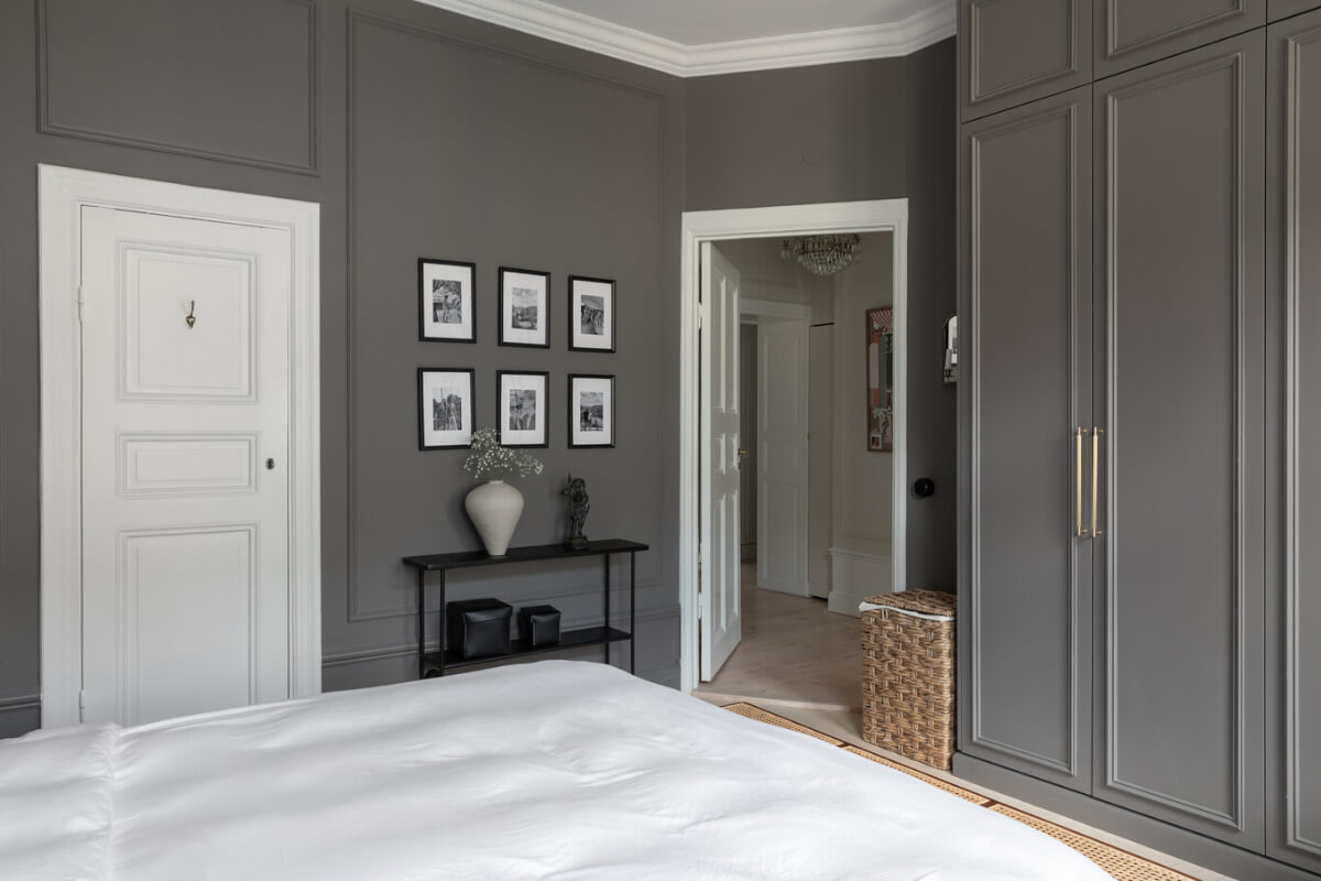 A Calm, Neutral Color Palette in a Classic Swedish Apartment 20 dark gray bedroom wardrobe wall
