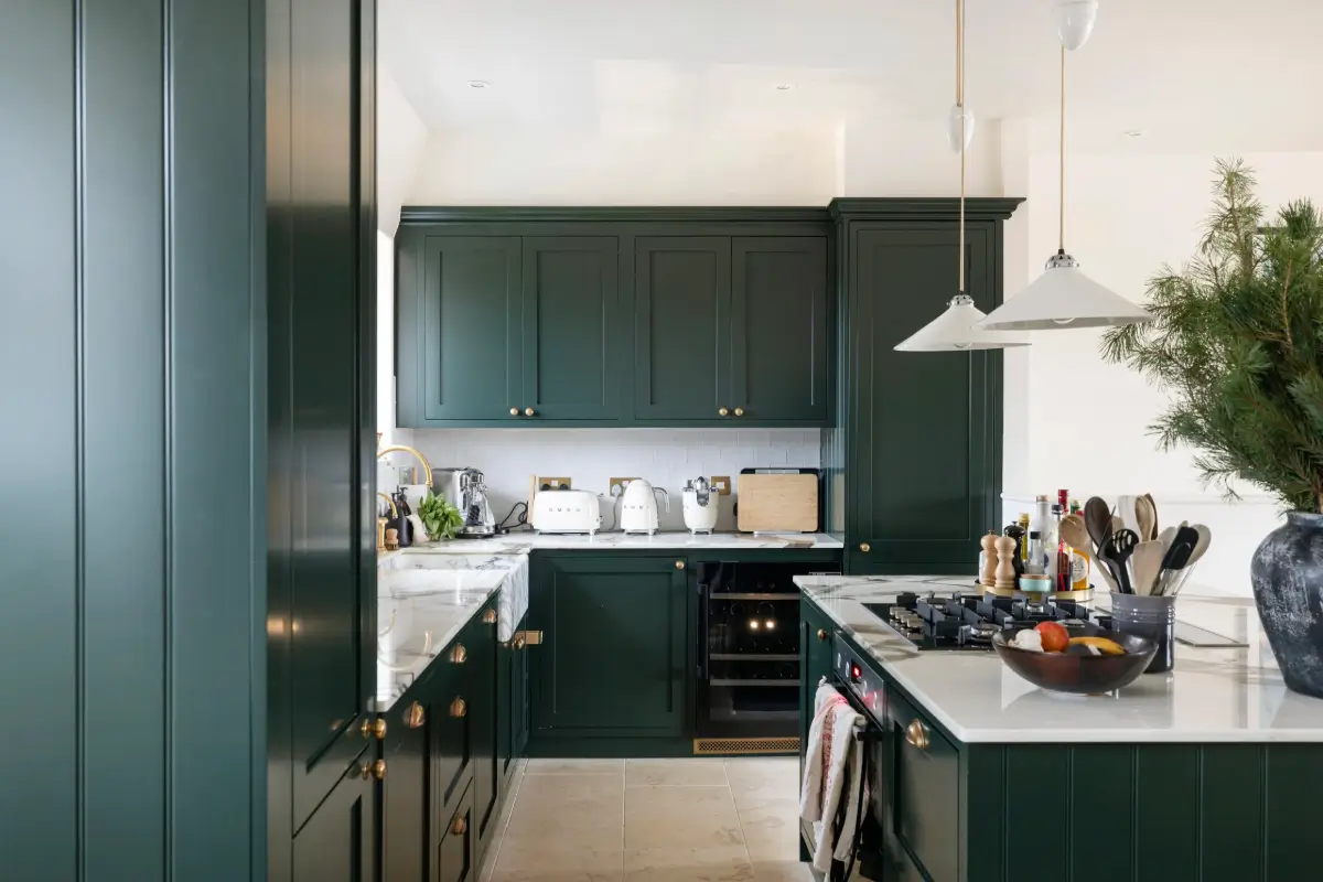 A Beautiful Duplex Apartment in a Notting Hill Townhouse 10 dark green kitchen marble sink