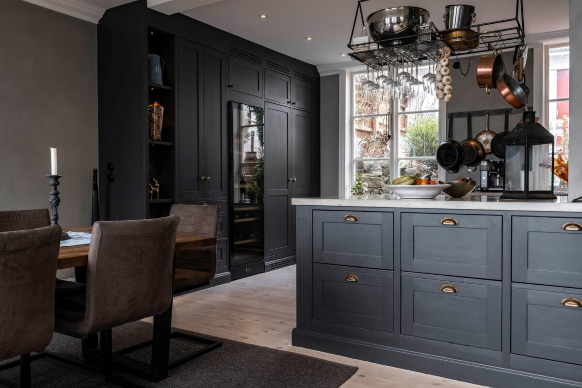 A Renovated 19th-Century Villa on Gotland 7 dark kitchen brass handles