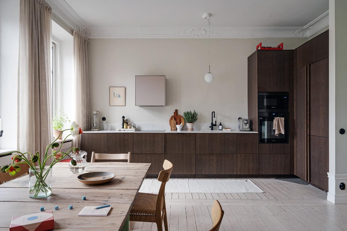Period Features and Modern Materials in a Swedish Apartment 10 dark stained ash veneer kitchen superfront