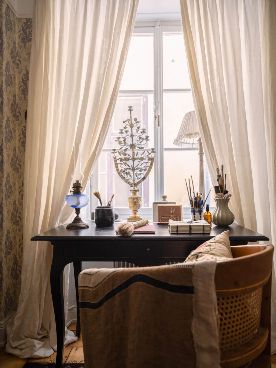 A Charming Home in a 17-Century Apartment in Stockholm's Old Town 23 desk under window