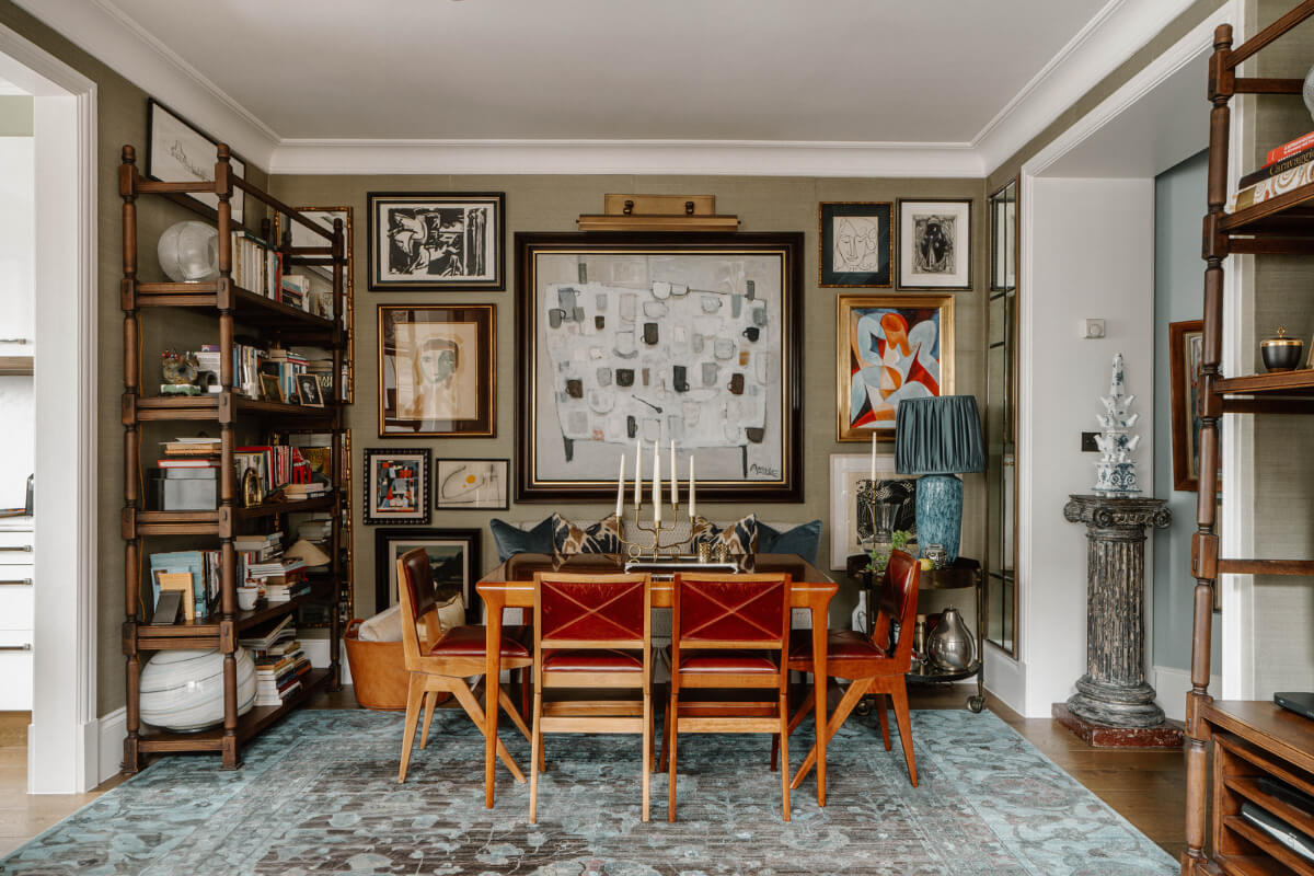 A Cozy Art-Filled Attic Apartment in London 6 dining area with gallery wall