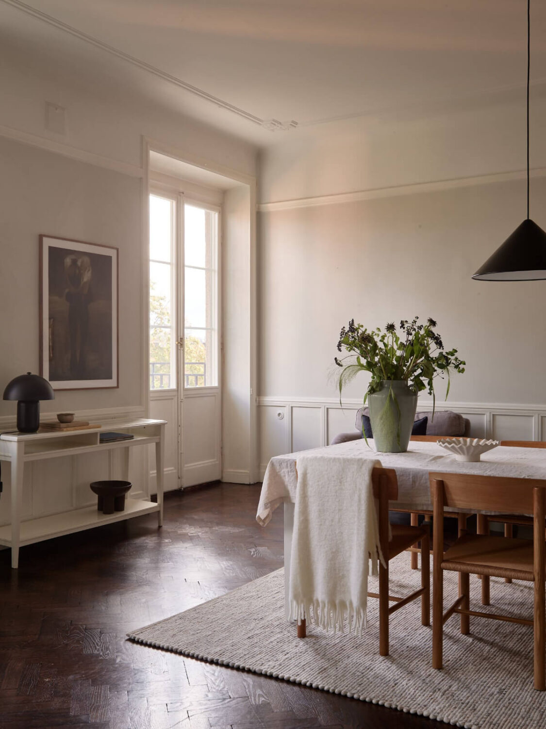 A Grand Early 20th-Century Apartment in Stockholm 3 dining room dark parquet floor