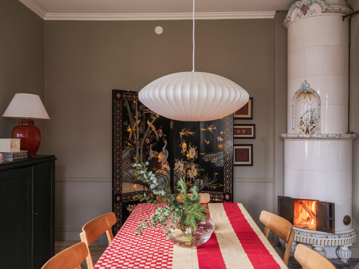 A Beautiful Turn-of-the-Century Family Home in Sweden 12 dining room fireplace decorated folding screen