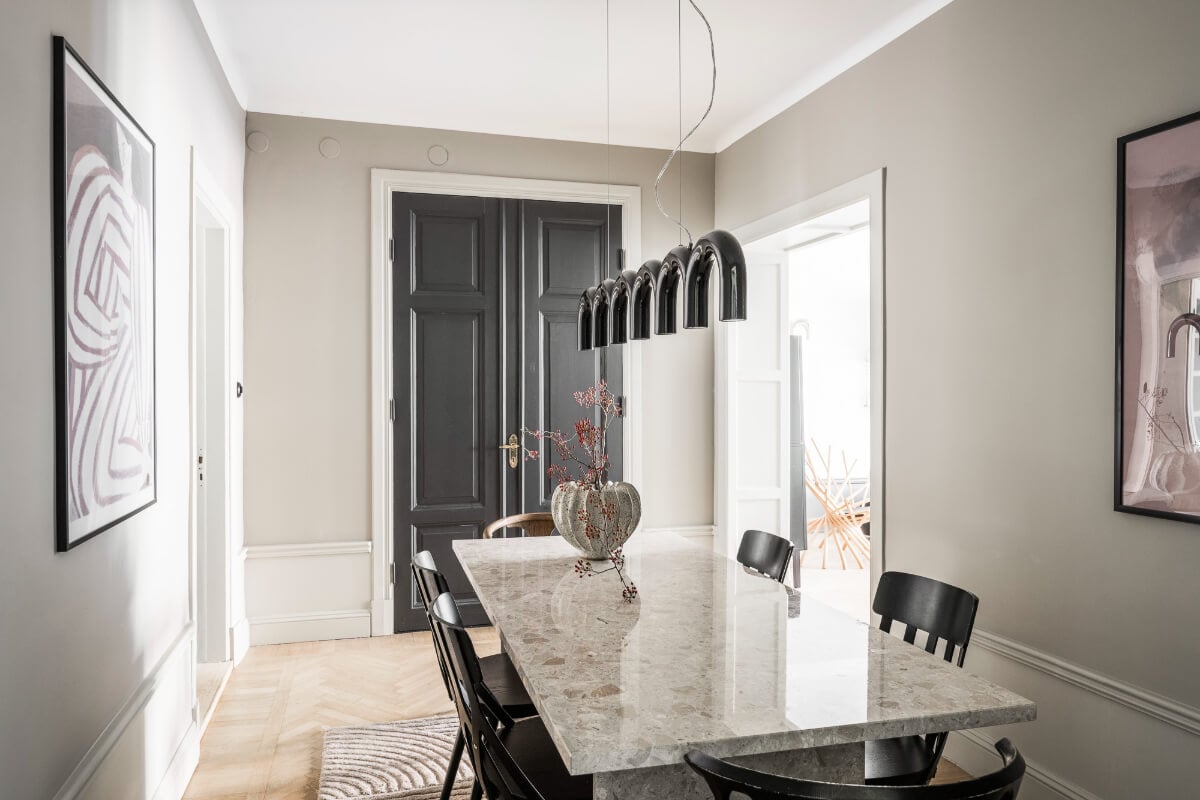 A Swedish Apartment with Exclusive Materials and Monochrome Color Scheme 6 dining room parquet floor art