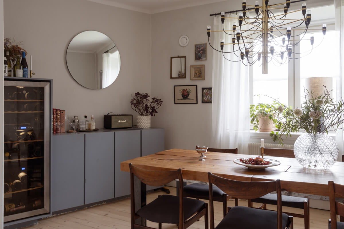 A Swedish Maisonette Apartment with Basement Bedrooms 11 dining room wooden table ikea ivar cabients