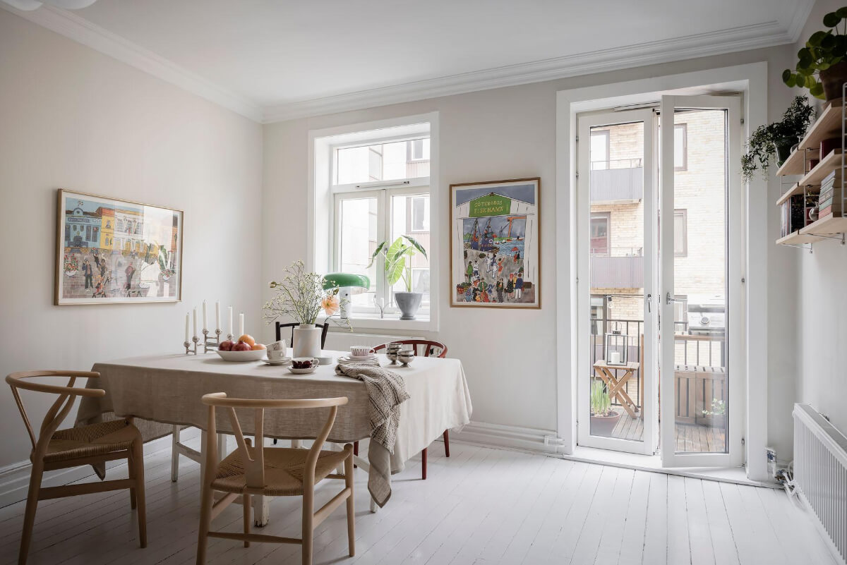 White-Painted Floorboards in a Turn-of-the-Century Apartment 7 dining table bright living room