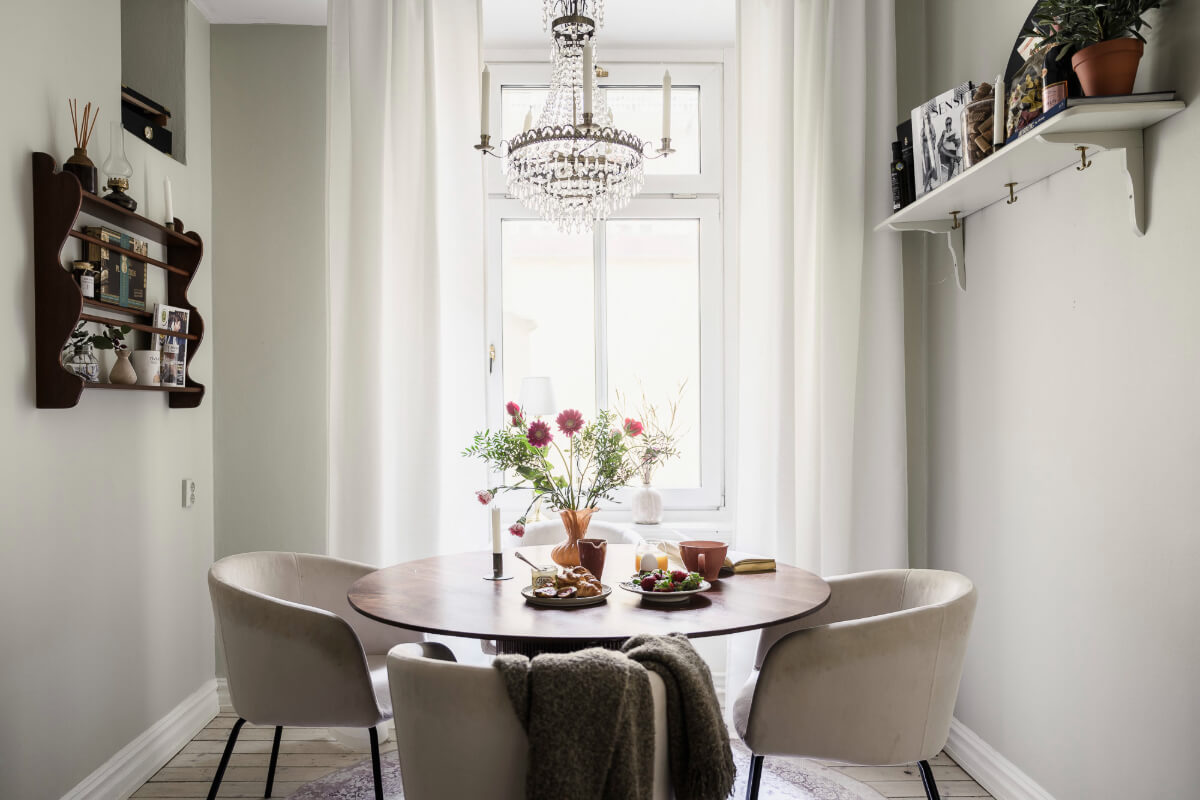 Limewash Wall and Period Features in a Swedish Apartment 12 dining table in kitchen