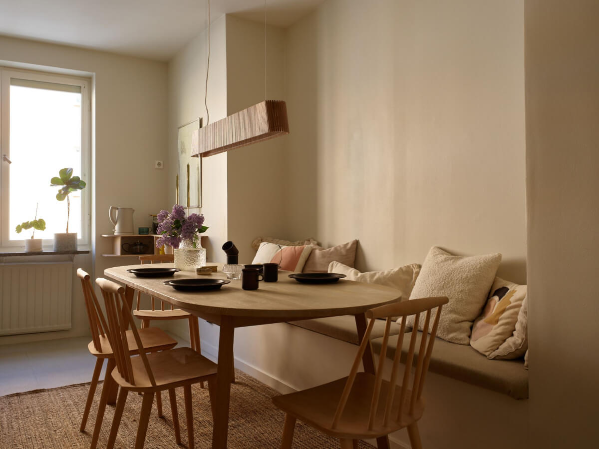 A Stockholm Apartment with a Beautifully Renovated Kitchen 12 dining table with bench