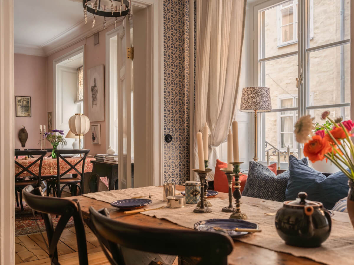 A Charming Home in a 17-Century Apartment in Stockholm's Old Town 12 double doors between kitchen living room