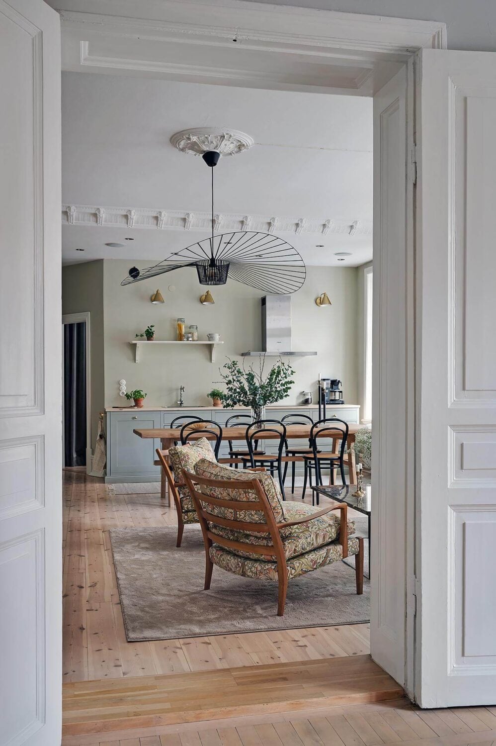 A Swedish Apartment with an Open Living Space and Period Features 19 double wooden doors living room