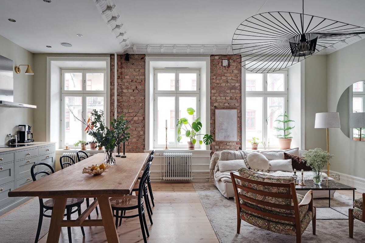 A Swedish Apartment with an Open Living Space and Period Features 8 exposed brick wall scandi living room
