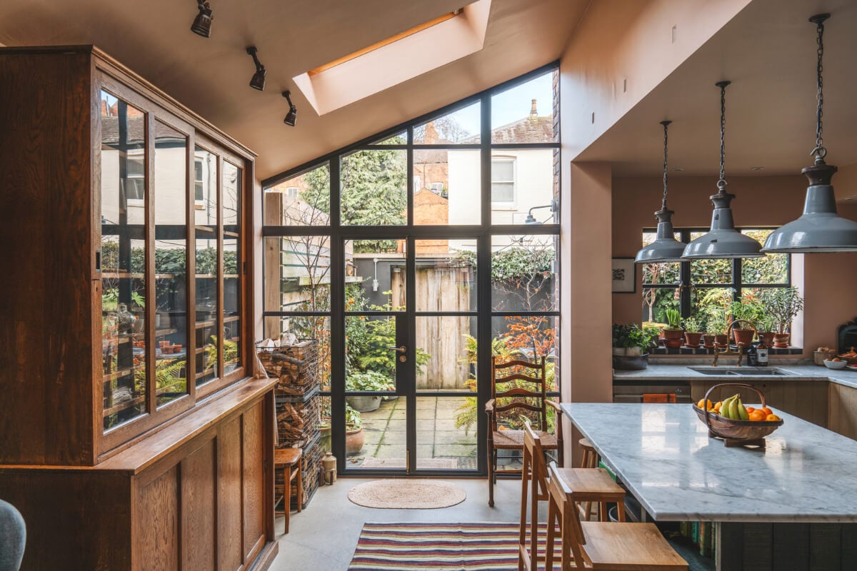 A Renovated Georgian Townhouse with a Stunning Kitchen Extension 9 extended kitchen slanted ceiling glass crittall wall