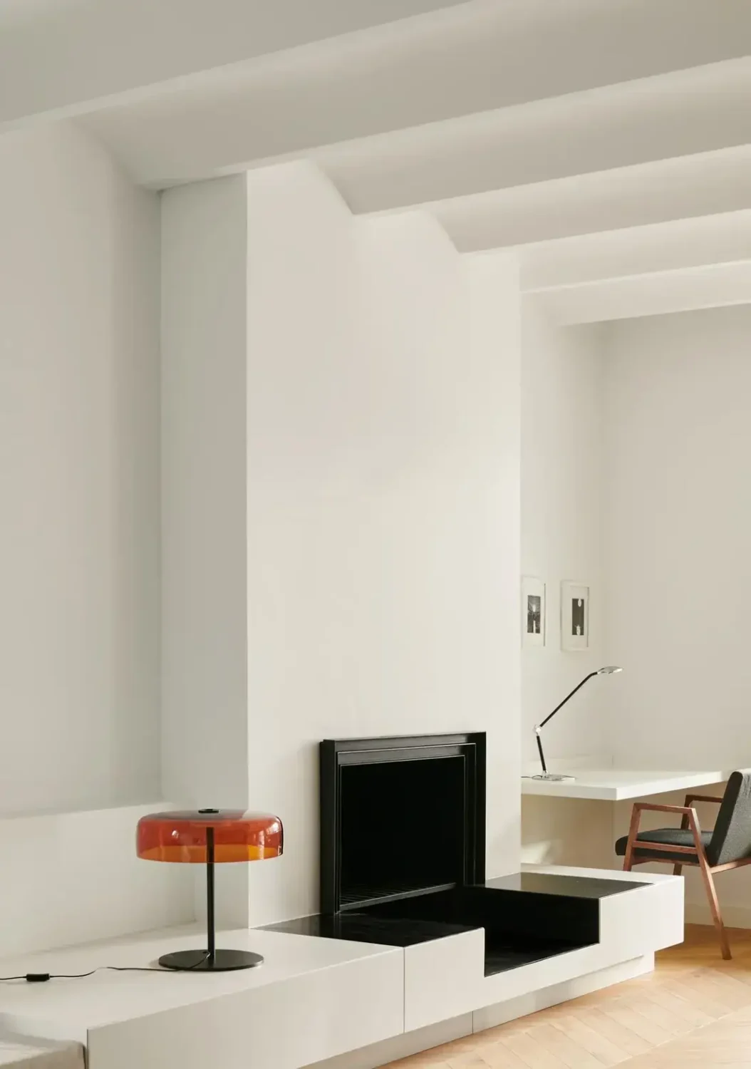 A Modern Barcelona Apartment with a Pink Bathroom 4 fireplace detail and desk