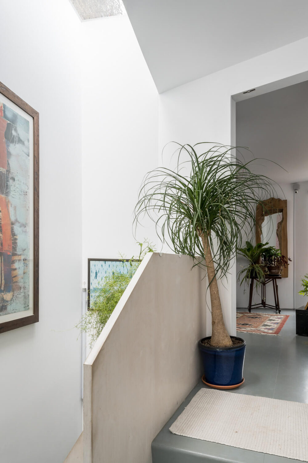 A Unique House in London with Plant-Filled Interiors and a Lush Garden 20 first floor landing