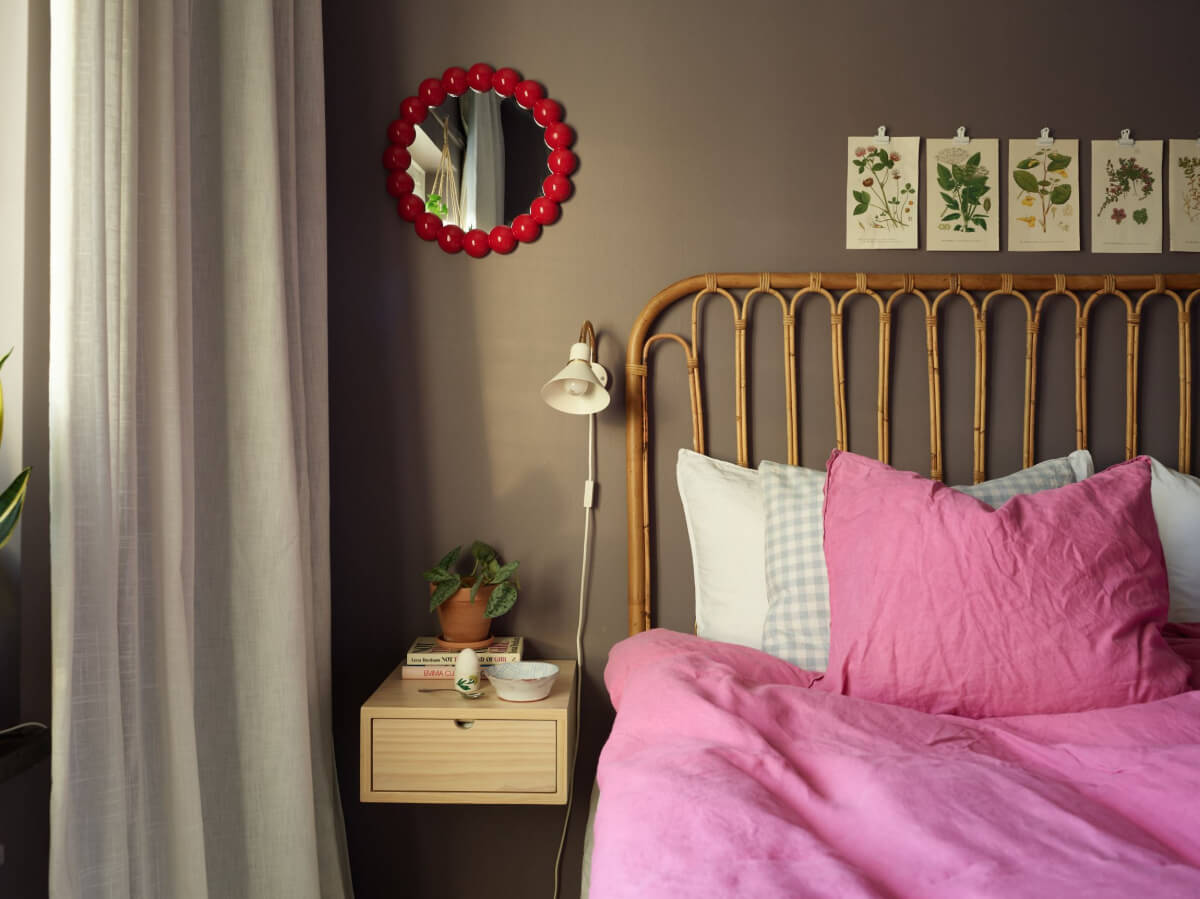 A Colorful Midcentury Apartment Filled with Art and Plants 17 floating nightstand