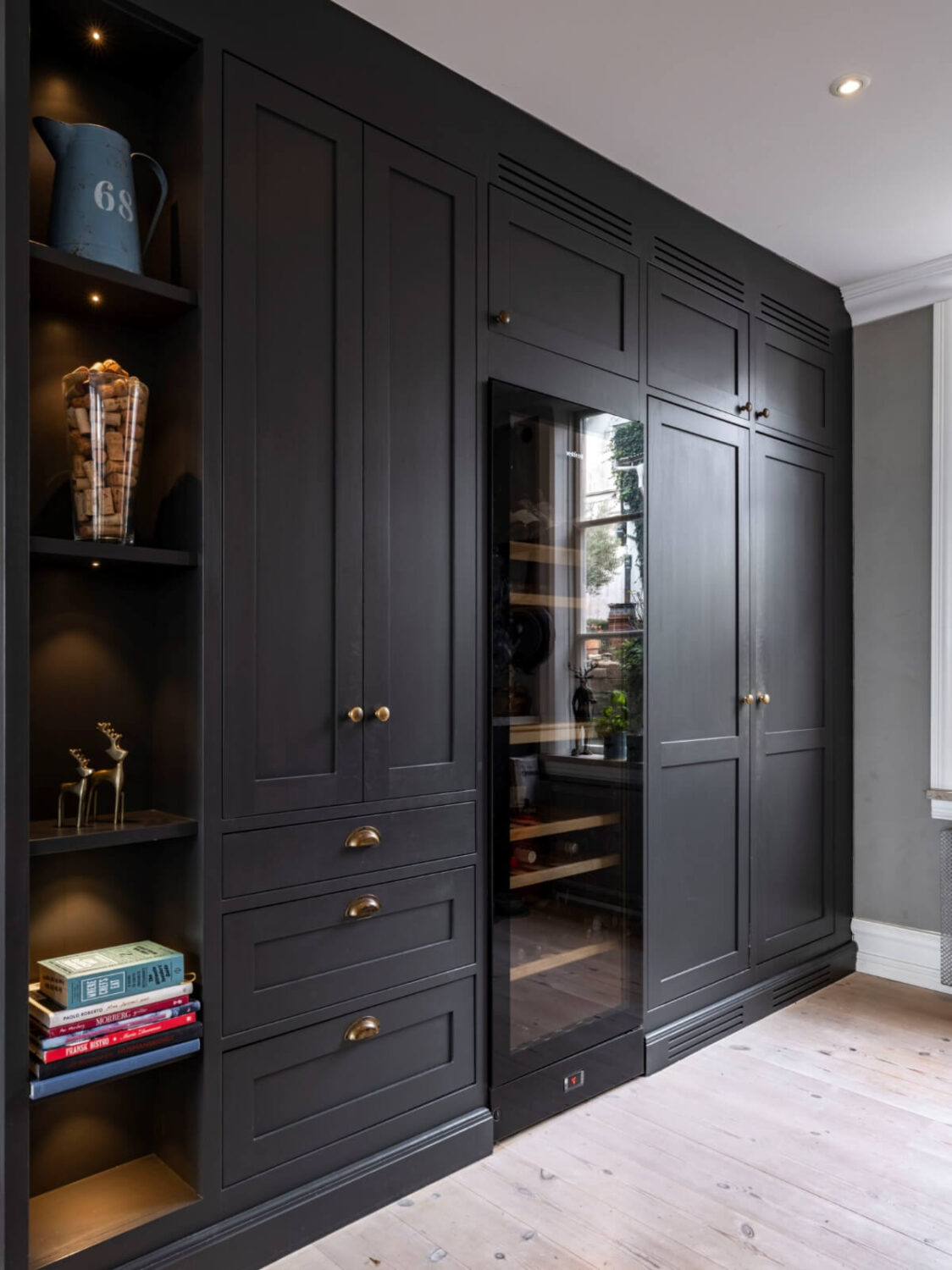 A Renovated 19th-Century Villa on Gotland 5 floor to ceiling kitchen cabinets and wine fridge
