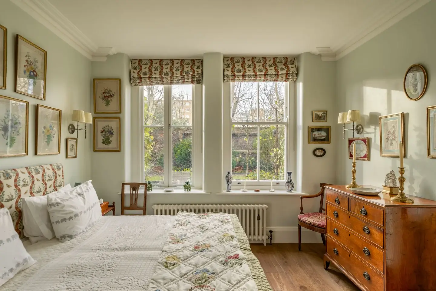 Classic Interiors and Antiques in an Art-Filled London Apartment 9 floral textiles cozy bedroom