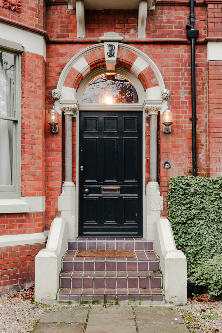 A Grand Victorian Villa in Manchester with Bold Interiors 39 front door red brick victorian villa