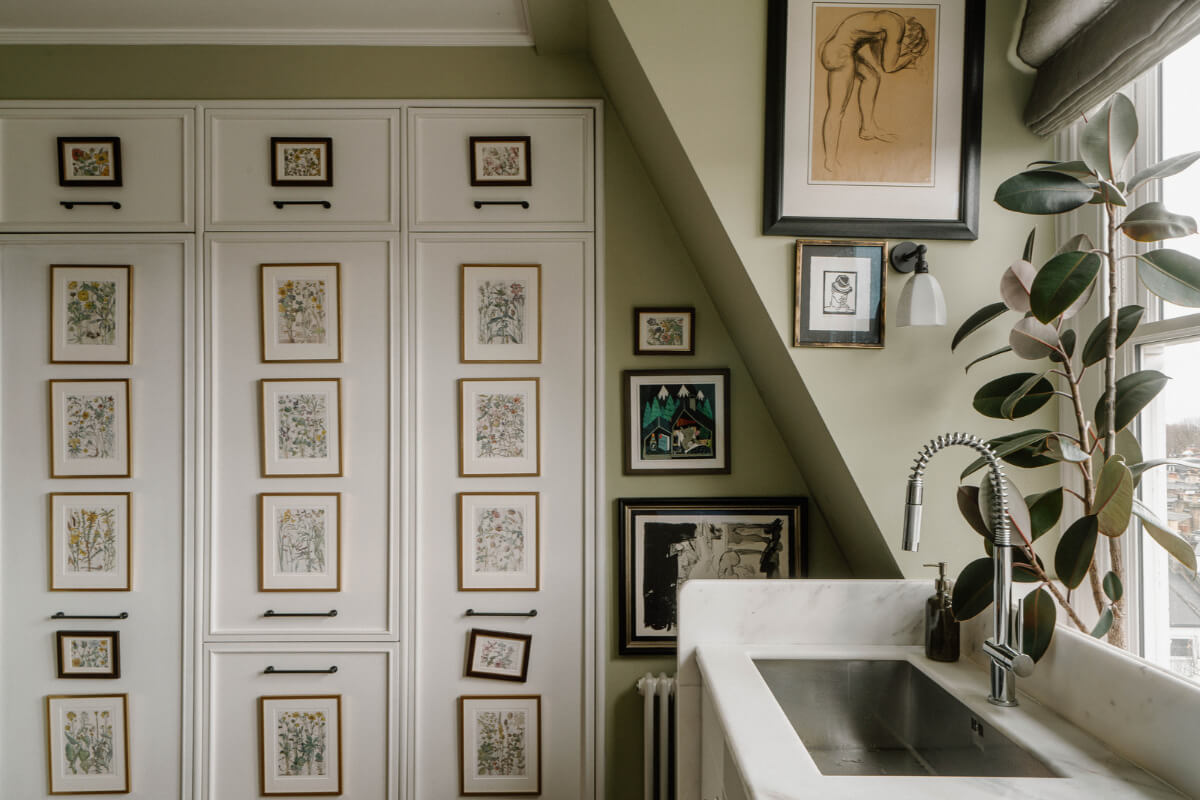A Cozy Art-Filled Attic Apartment in London 11 gallery wall