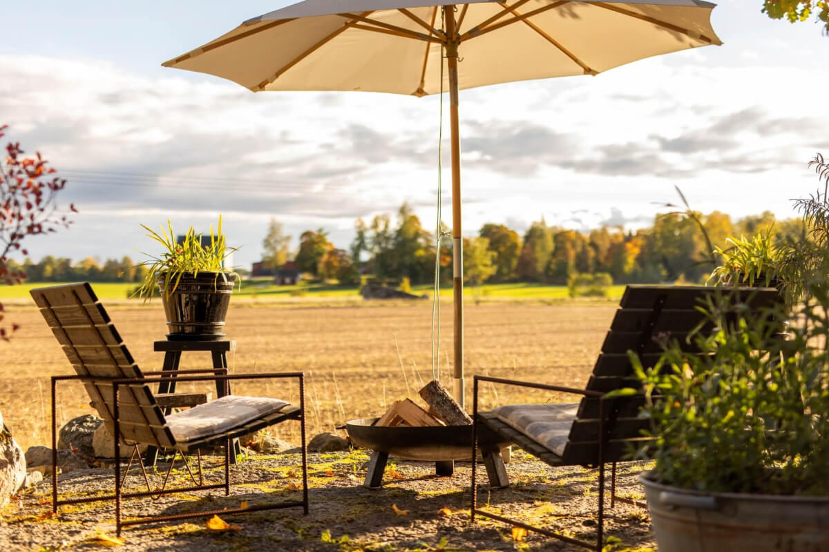A Swedish Architectural Villa Surrounded by Nature 27 garden seating firepit