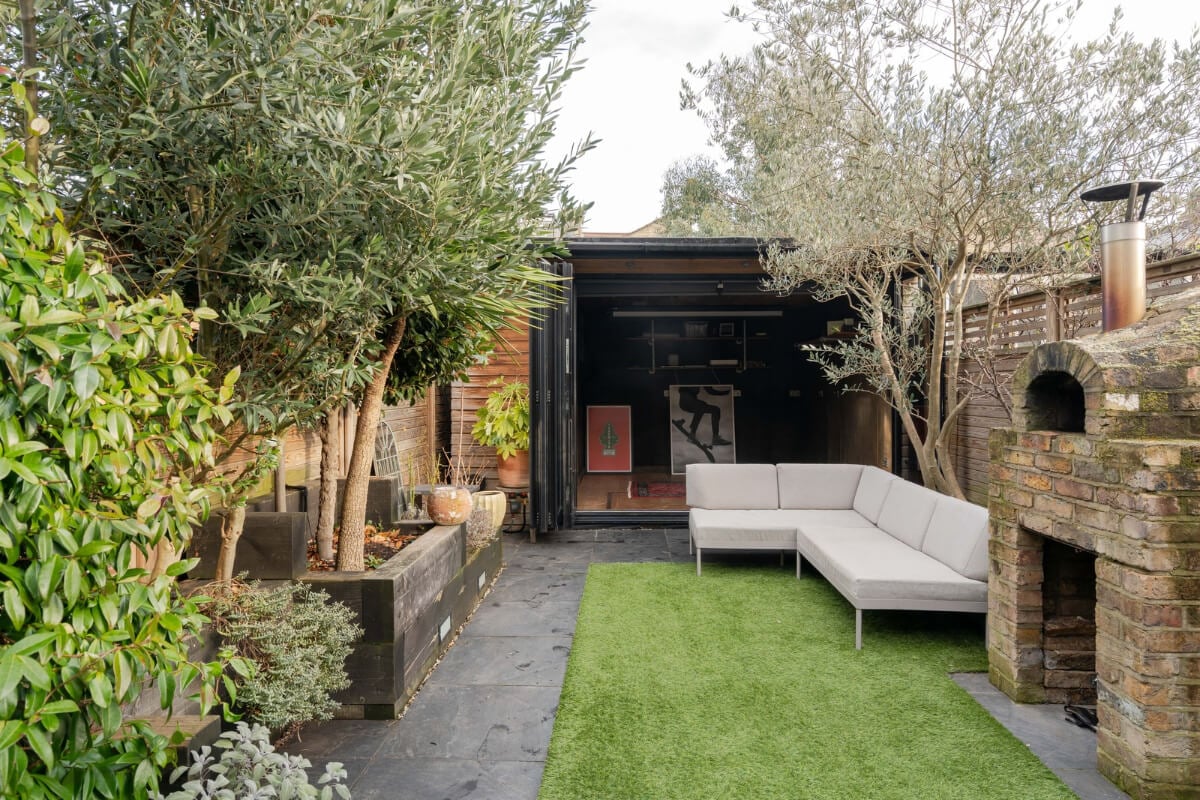 A Restored Victorian House with Exposed Brick and a Kitchen Extension 22 garden with shed