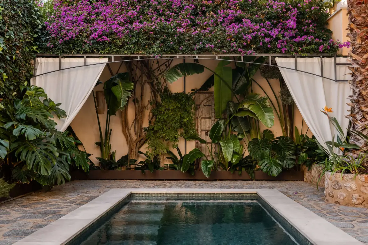 Old-World Craftsmanship and Contemporary Elegance in a Mallorcan Townhouse 17 garden with swimming pool townhouse mallorca