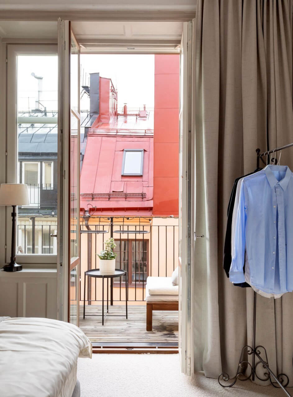 A Stylish Two-Bedroom Apartment in Stockholm 16 glass balcony door