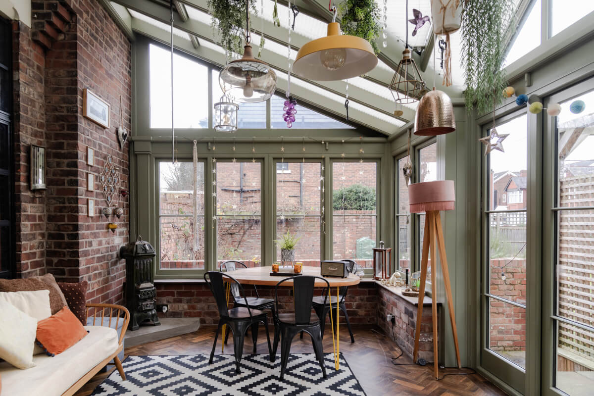 A Grand Victorian Villa in Manchester with Bold Interiors 14 glass extension brick wall dining table nordroom