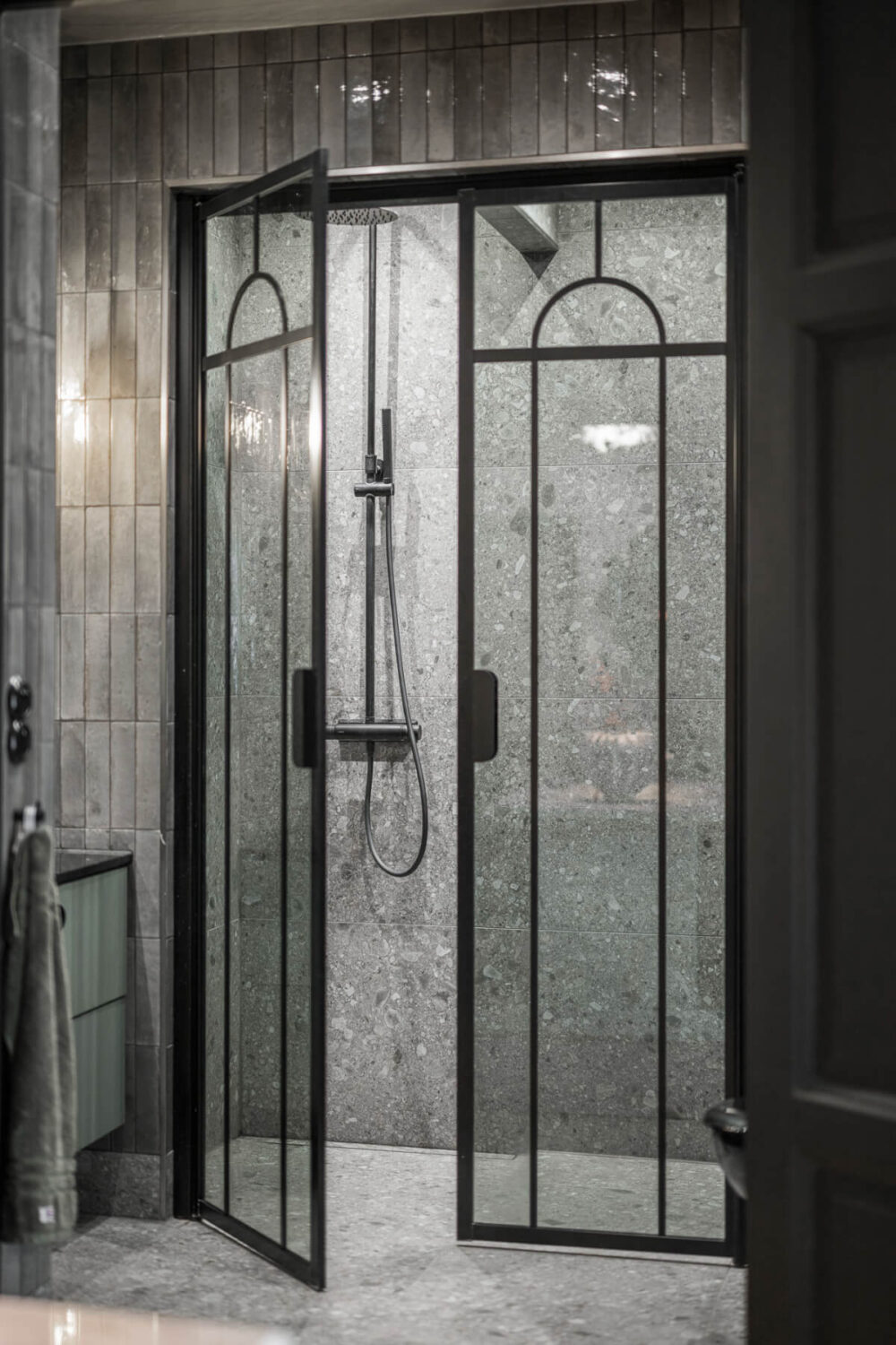 A Swedish Apartment with Exclusive Materials and Monochrome Color Scheme 16 glass shower doors