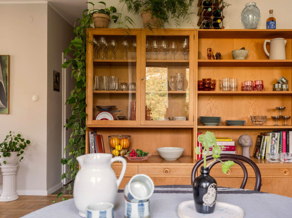 A Swedish 1940s Apartment with Lovely Balcony Views 12 glass wooden cabinet