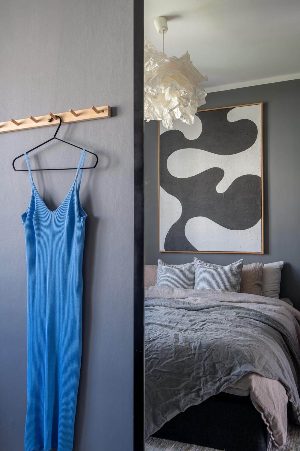 Light Rooms and a Moody Color Palette in a 1930s Apartment 24 gray bedroom large mirror