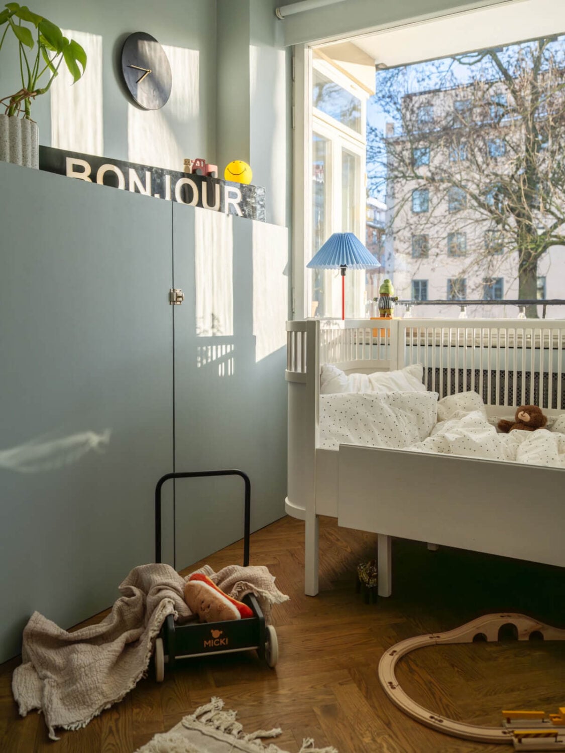 A Light, Renovated Two-Bedroom Apartment in Stockholm 20 gray-blue baby room