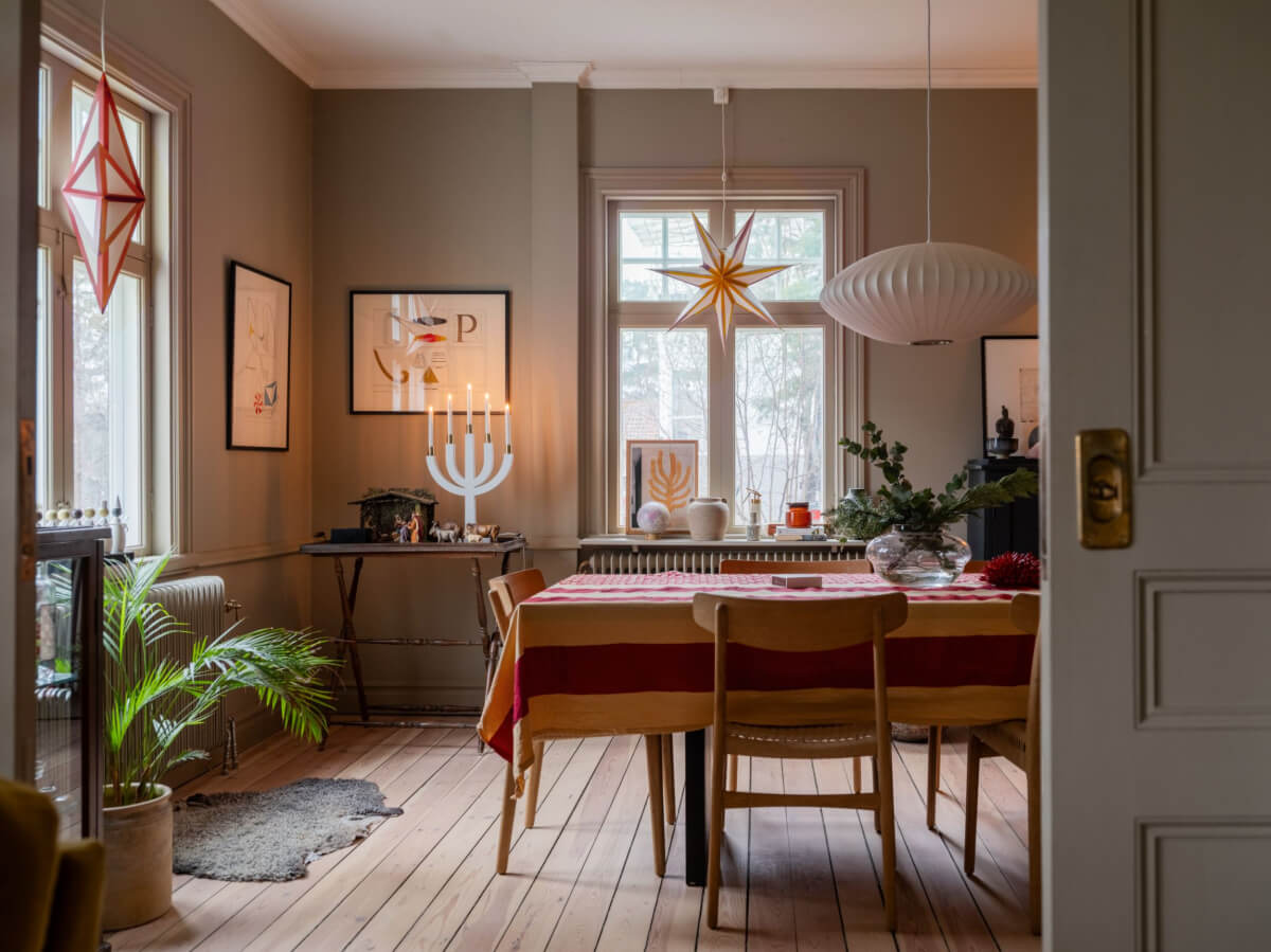 A Beautiful Turn-of-the-Century Family Home in Sweden 10 gray dining room wooden floorboards