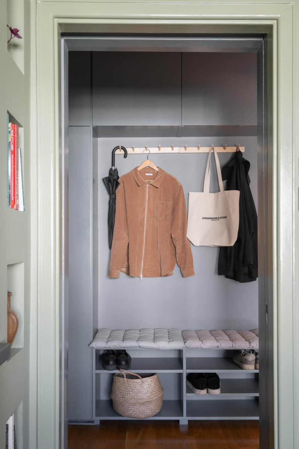 Light Rooms and a Moody Color Palette in a 1930s Apartment 26 gray hallway storage