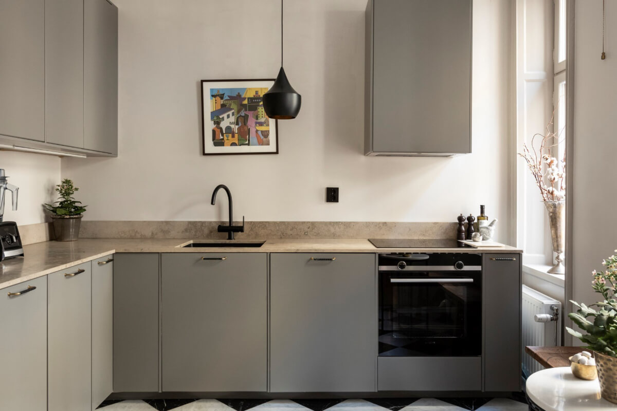 A Stylish Two-Bedroom Apartment in Stockholm 11 gray kitchen black fittings