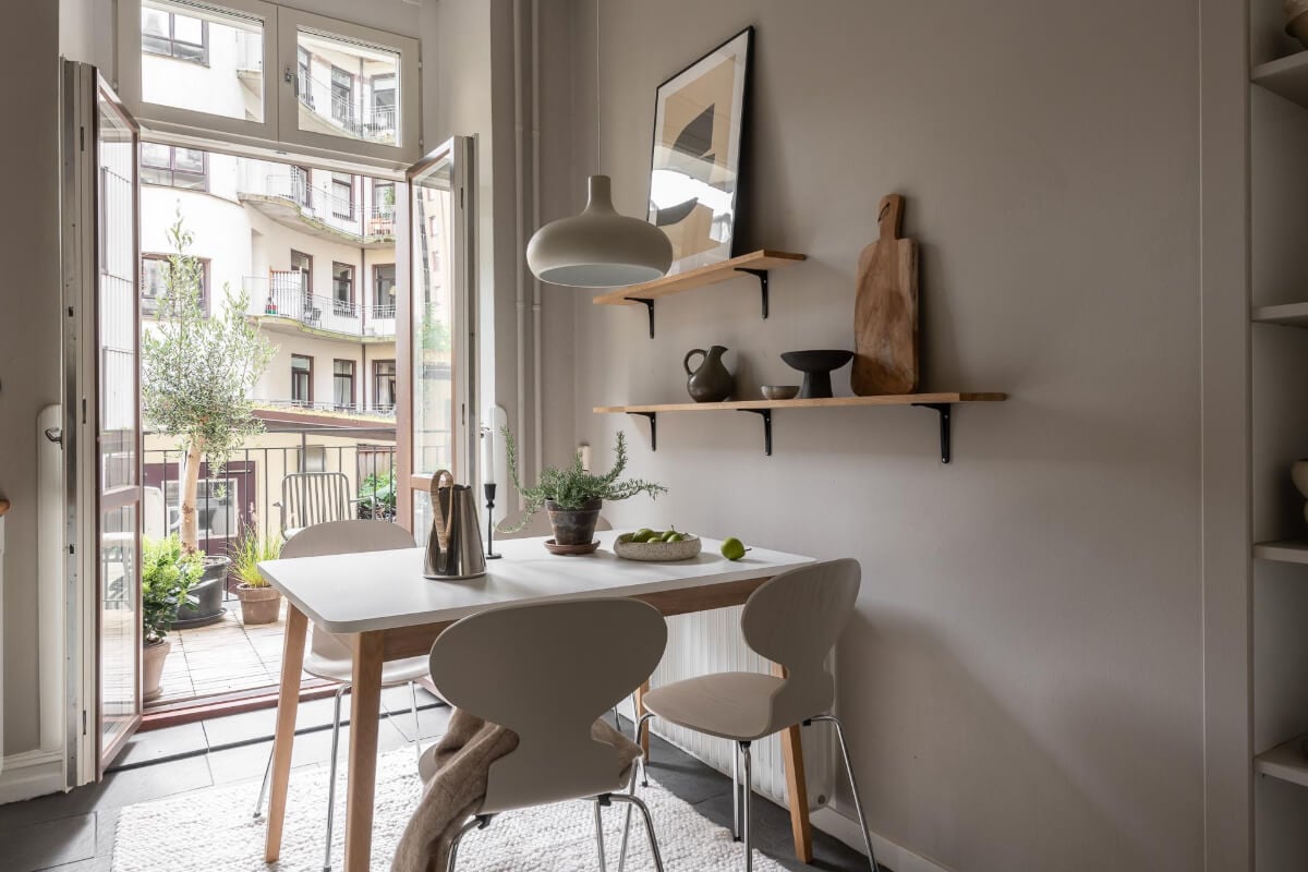 A Serene Studio Apartment with a Loft Bed and a Large Balcony 15 gray kitchen with balcony A Serene Studio Apartment with a Loft Bed and a Large Balcony