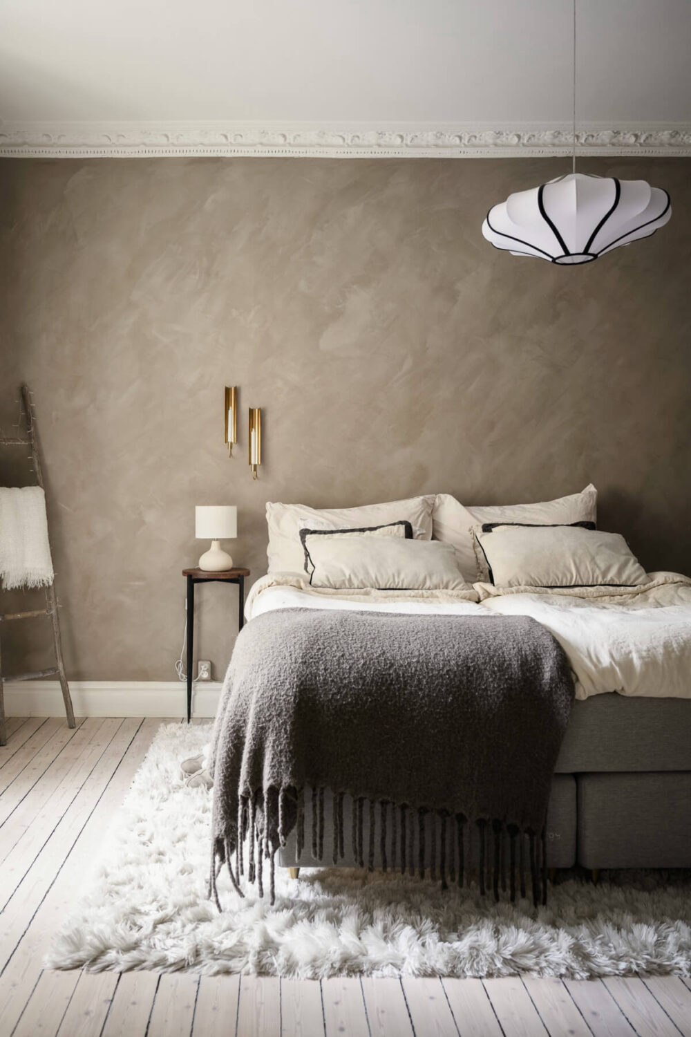 Limewash Wall and Period Features in a Swedish Apartment 17 gray limewash walls bedroom fluffy white rug