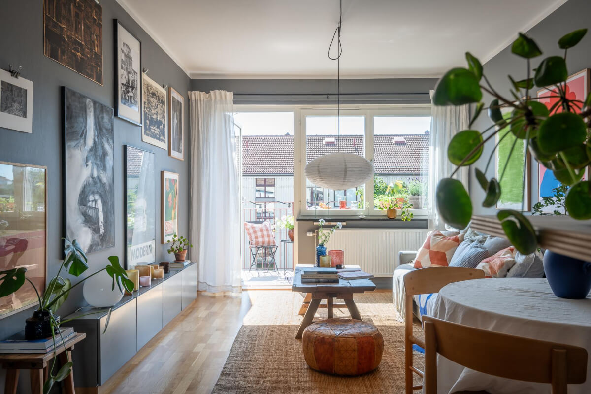 Light Rooms and a Moody Color Palette in a 1930s Apartment 7 gray living room art natural light