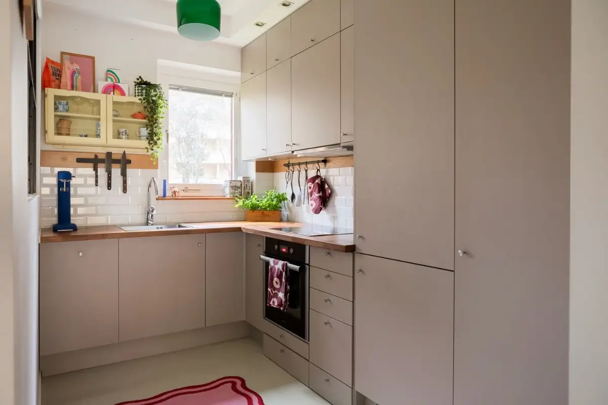 A Swedish Apartment with a Dutch Parquet Floor and Terracotta Bedroom 8 gray midcentury style kitchen