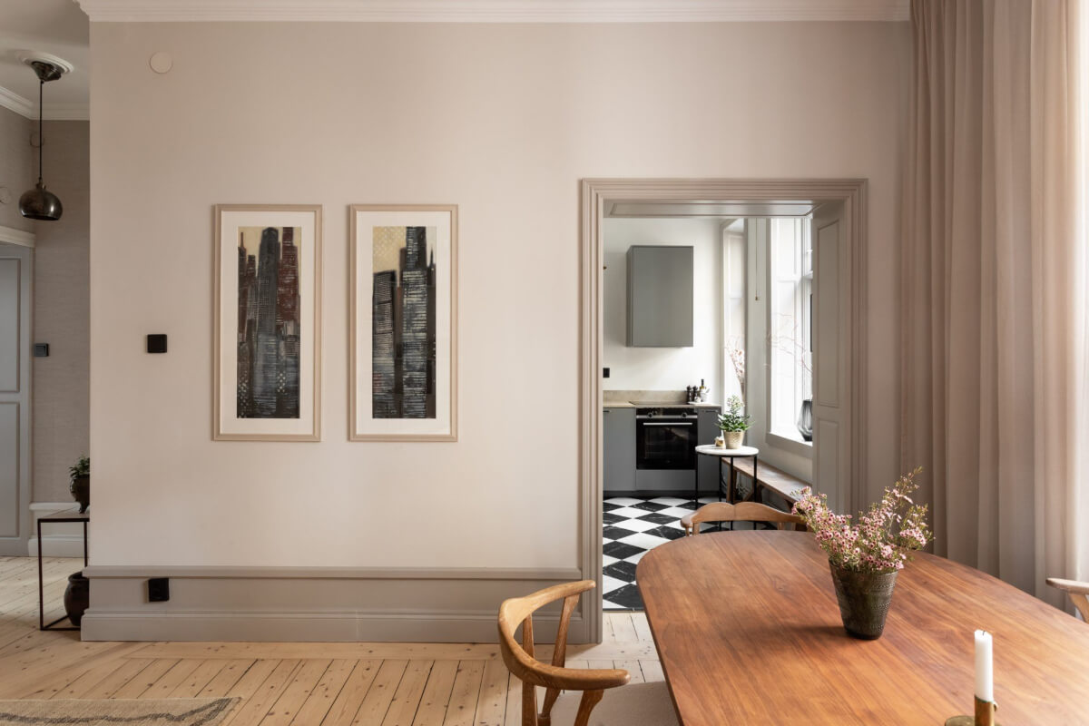 A Stylish Two-Bedroom Apartment in Stockholm 7 gray woodwork living room view into kitchen
