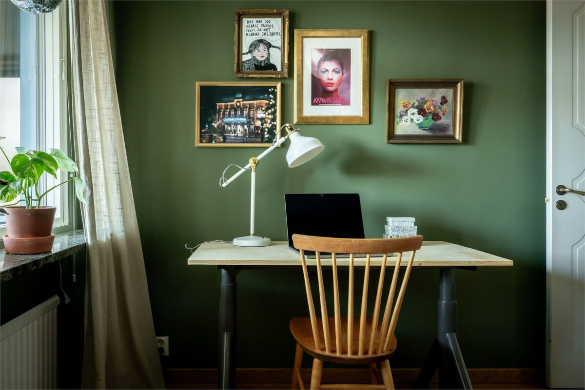 A Charming Apartment with Large Windows and Colorful Bedrooms 15 green bedroom desk