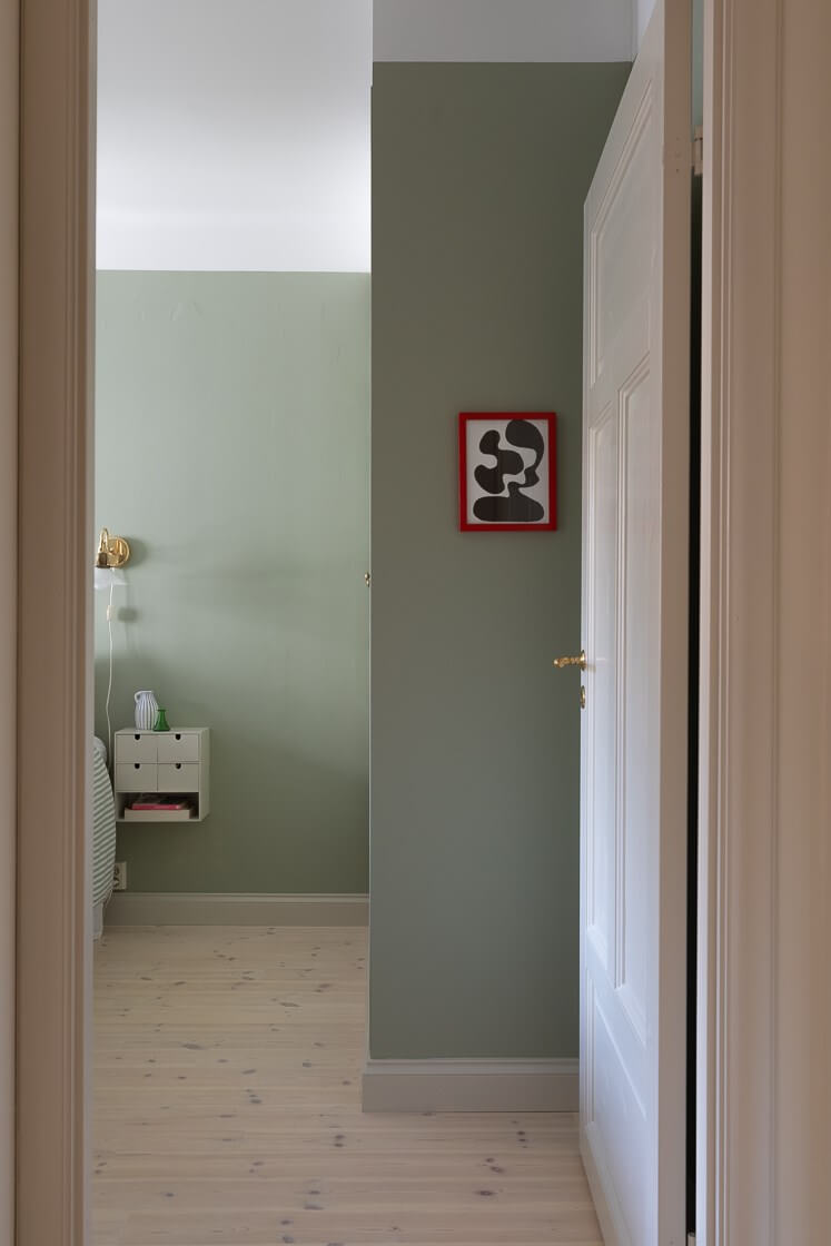 Modern Interiors in a Bright 1930s Apartment in Sweden 24 green bedroom