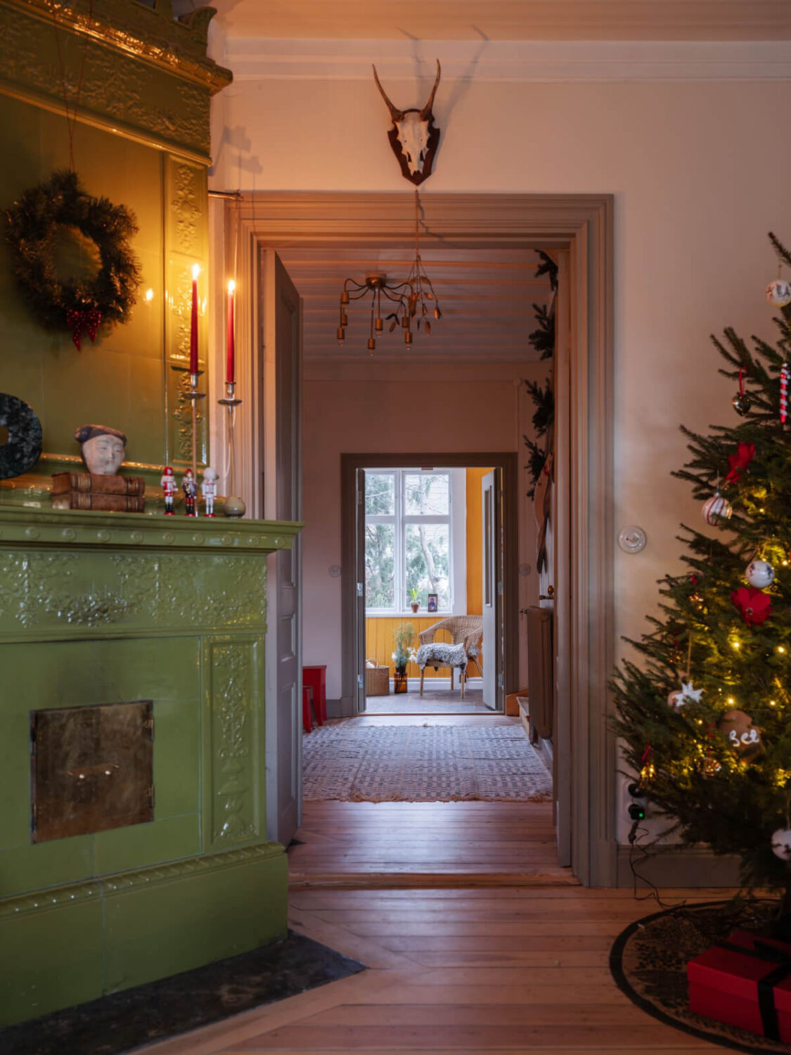 A Beautiful Turn-of-the-Century Family Home in Sweden 8 green fireplace