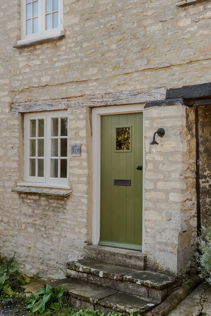 A Carefully Selected Color Palette in an 18th-Century English Cottage 19 green front door