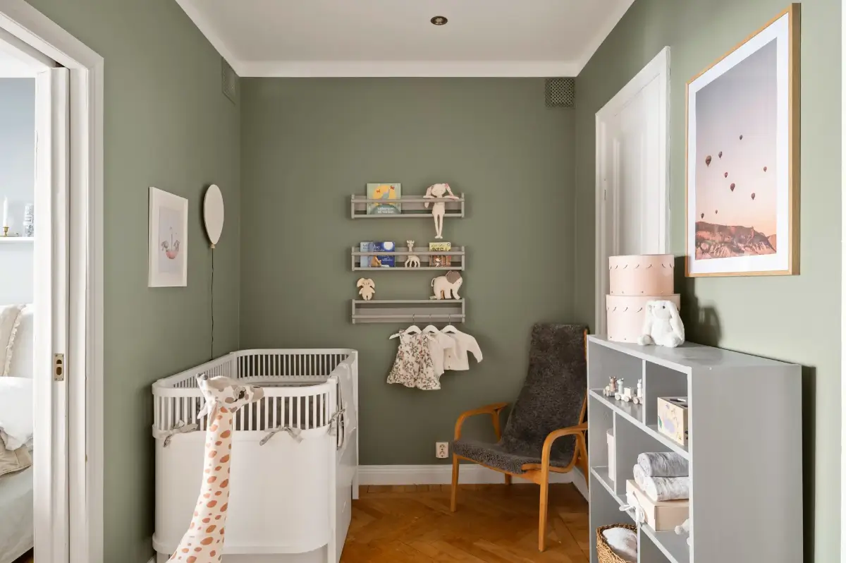 A Charming Ground Floor Family Apartment in Stockholm 19 green nursery