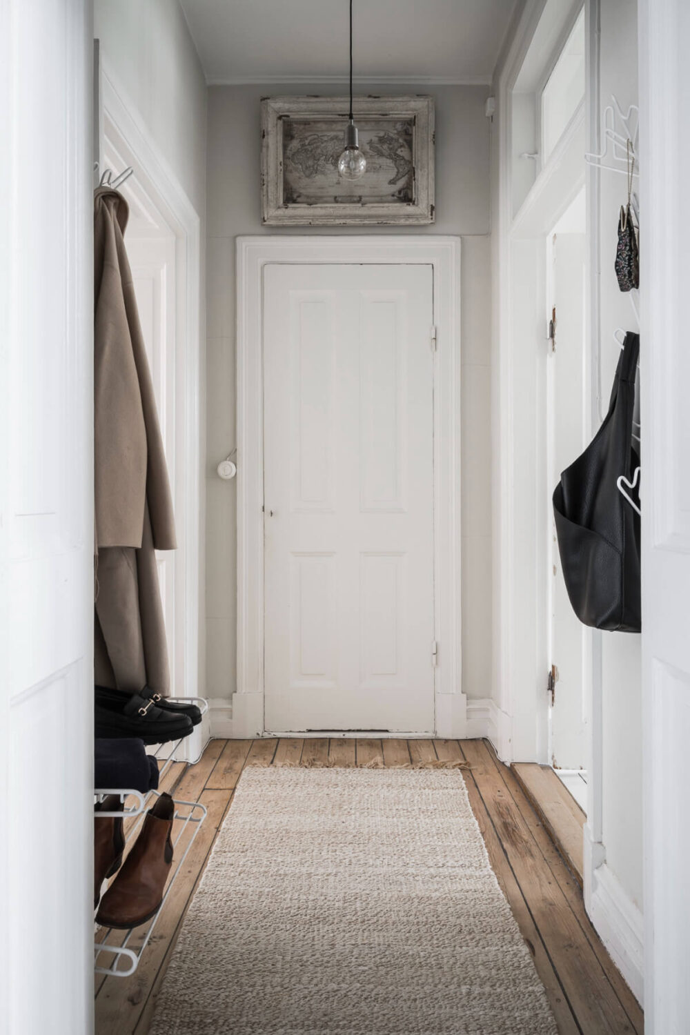 A Stylish Studio Apartment with Period Features and Large Windows 22 hall light gray walls