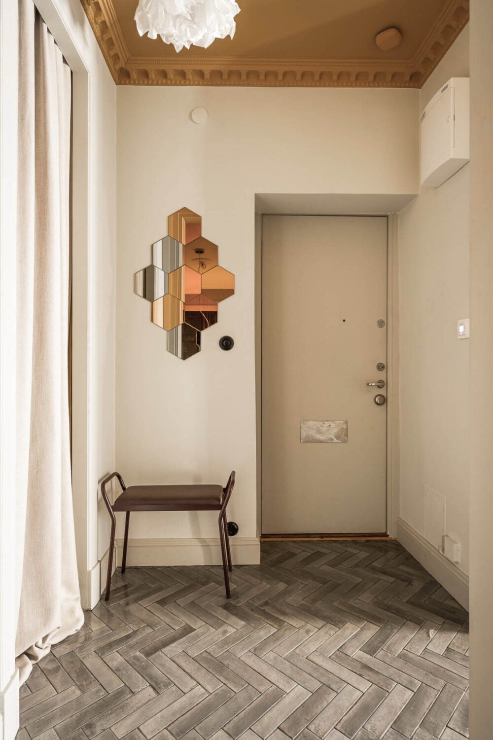 A Swedish Apartment with Exclusive Materials and Monochrome Color Scheme 25 hall painted ochre ceiling A Swedish Apartment with Exclusive Materials and Monochrome Color Scheme