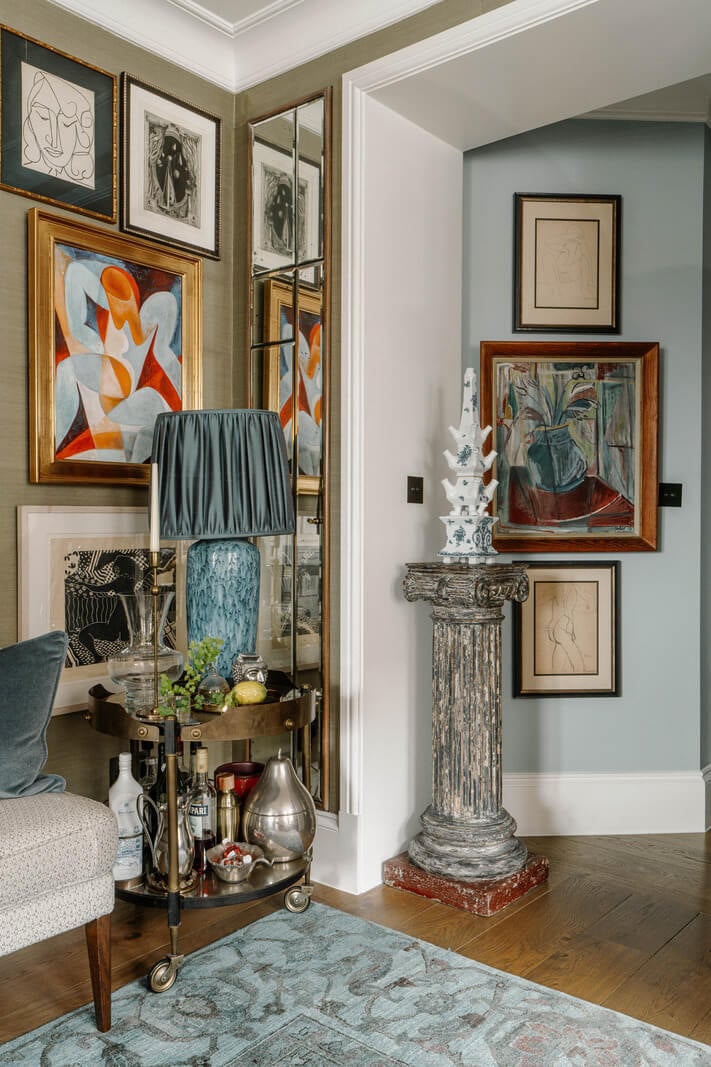 A Cozy Art-Filled Attic Apartment in London 21 hall space with art A Cozy Art-Filled Attic Apartment in London
